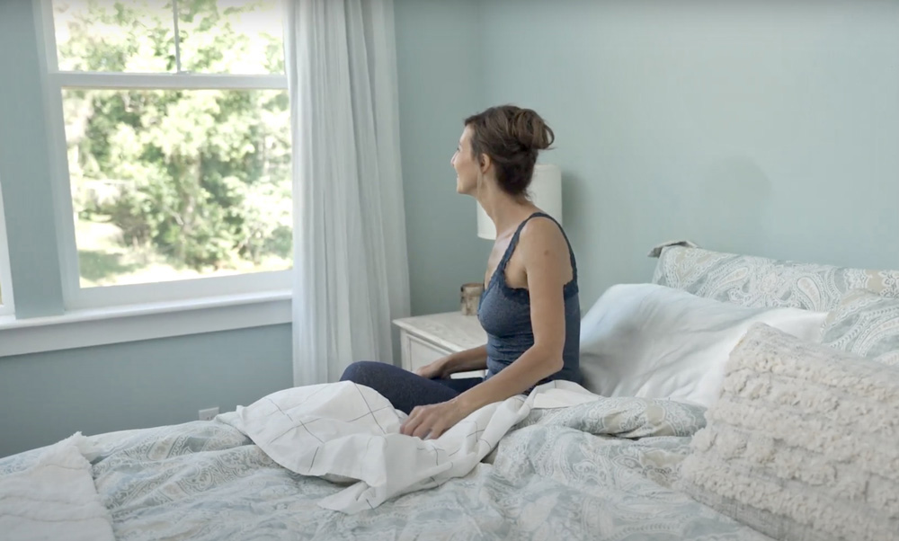 Nicole Apelian waking up from sleep in bedroon Nicole Apelian waking up from sleep in bedroon