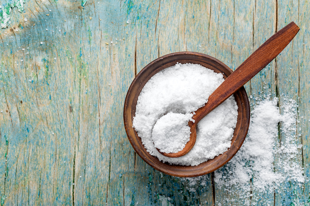 salt in bowl on weathered wood salt in bowl on weathered wood
