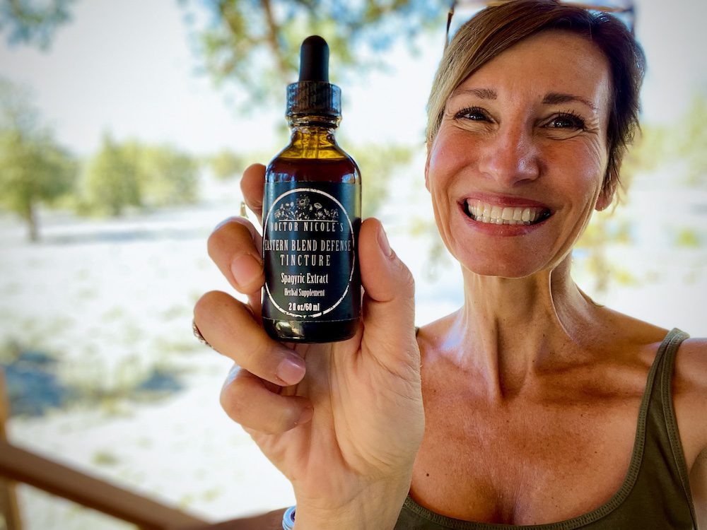 Eastern Blend honeysuckle knotweed japanese nicoles apothecary nicole apelian skullcap Nicole Apelian holding Eastern Blend Tincture