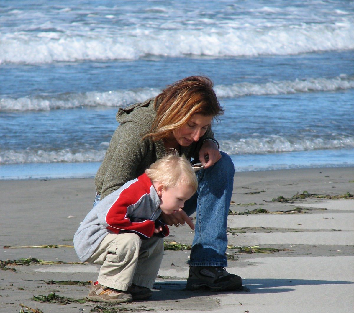 Nicole and her toddler son on the beach Supporting a Grieving Child: What Every Parent Should Know