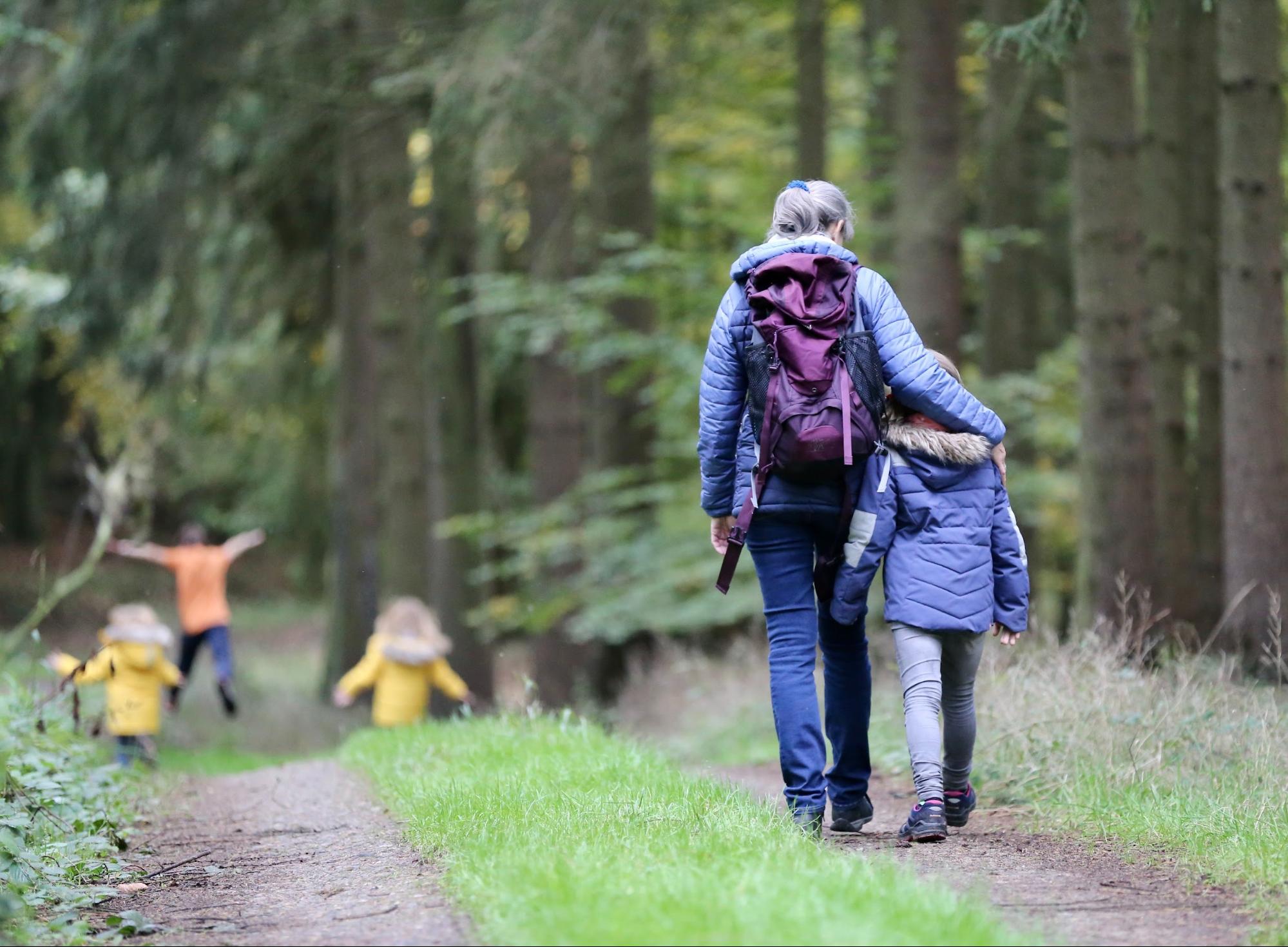 parent and child hiking together parent and child hiking together