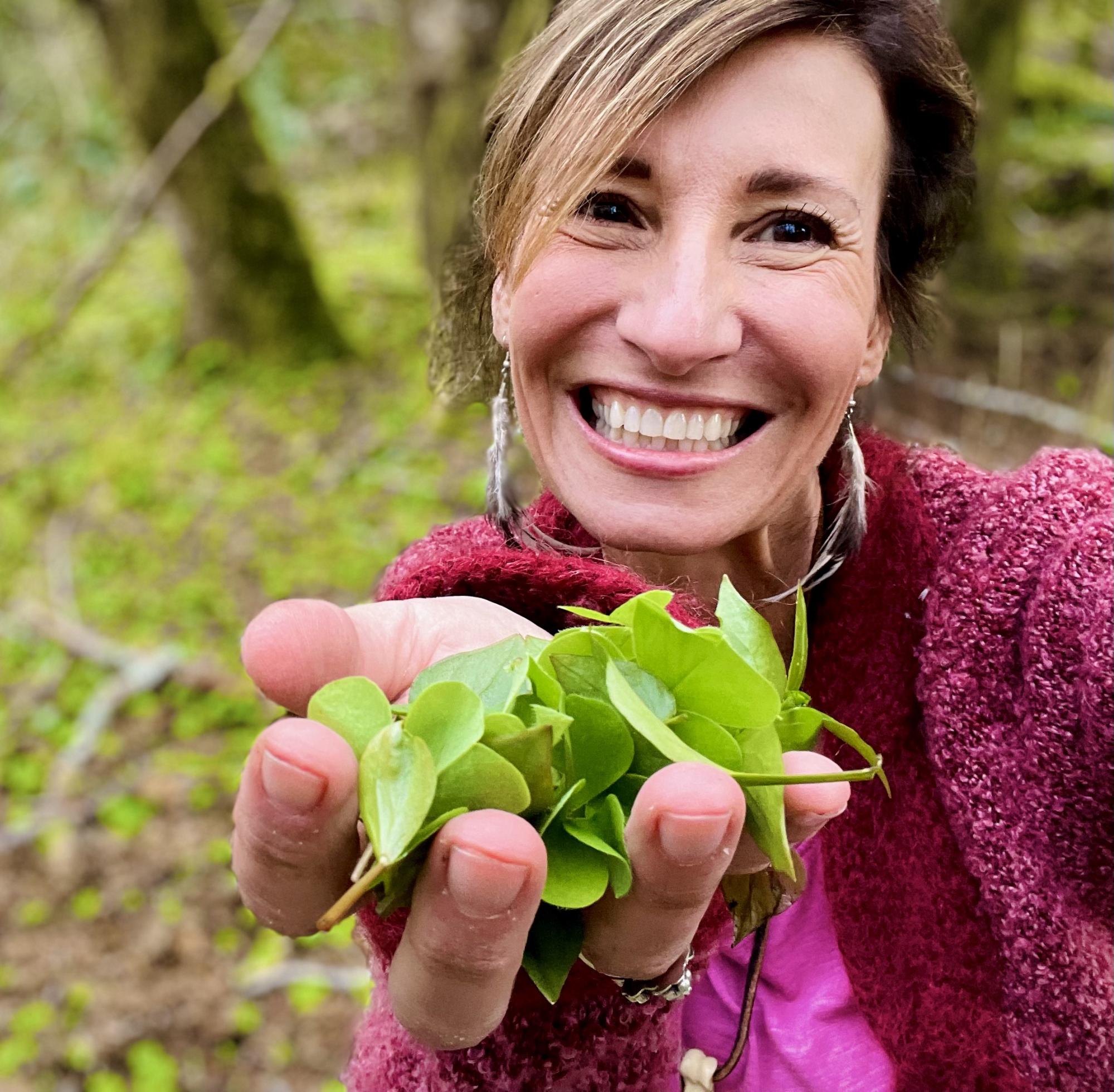 Nicole Apelian with handful of foraged plantain Nicole Apelian with handful of foraged plantain