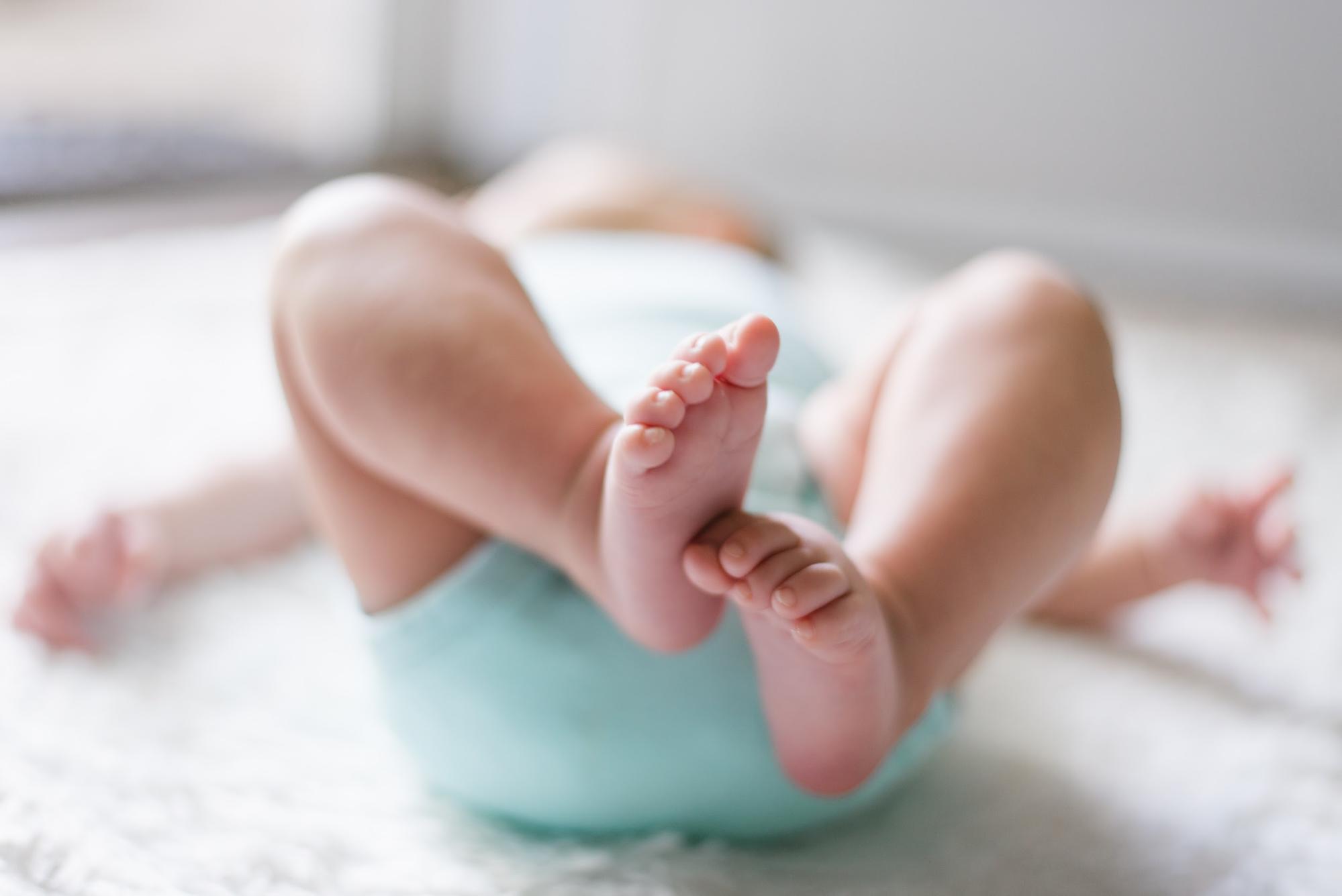 baby lying on the floor baby lying on the floor