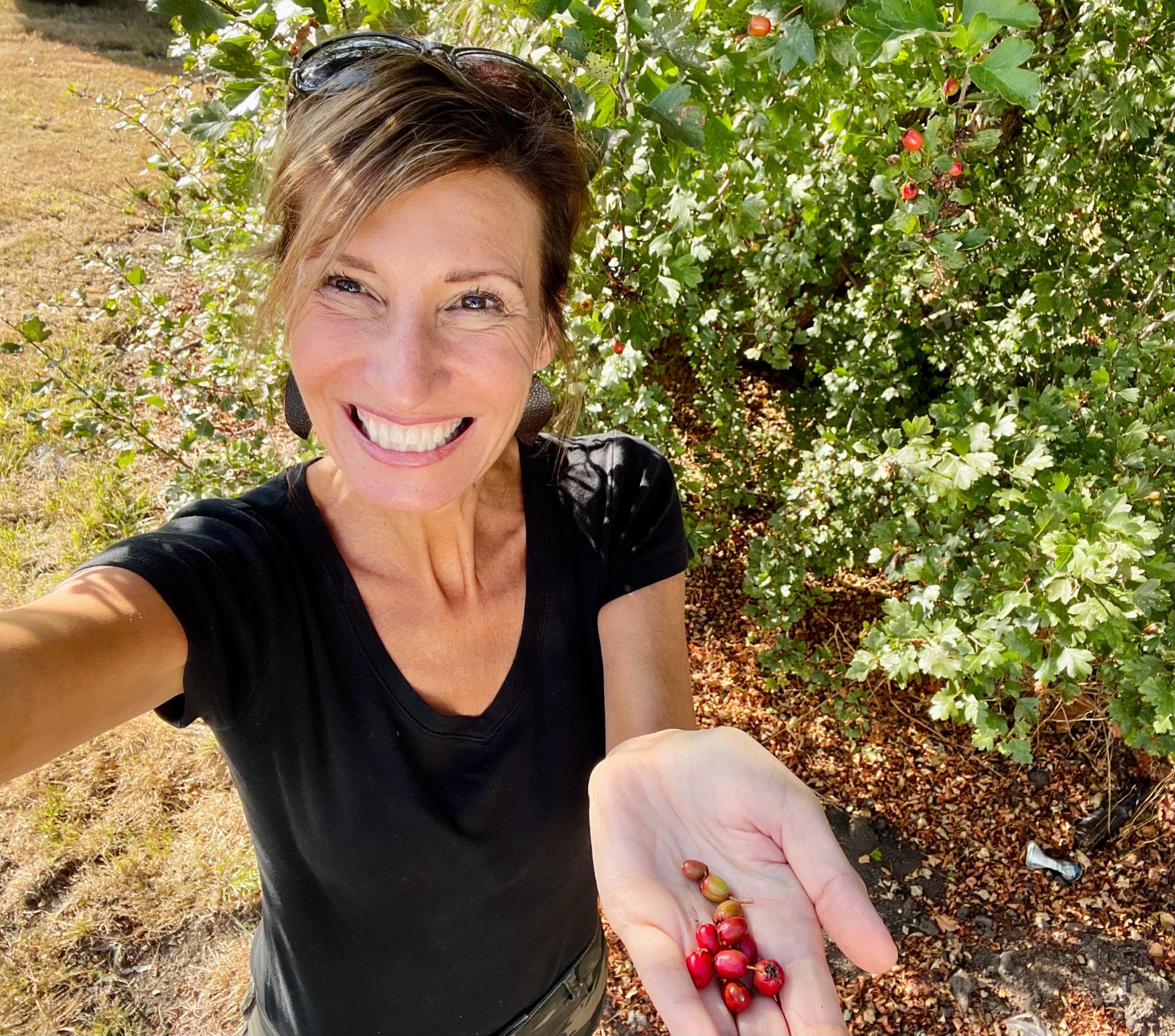 Nicole Apelian holding red bilberries