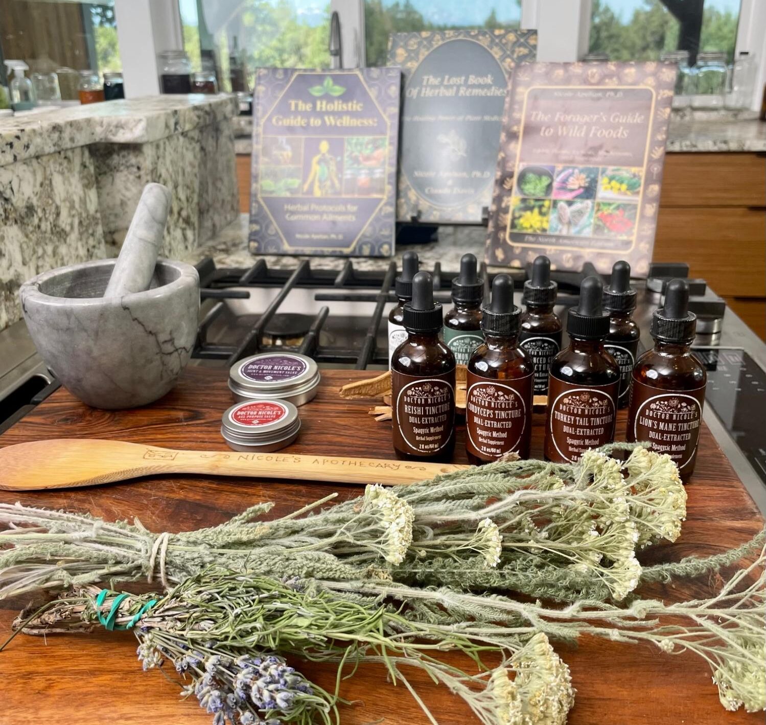 Nicole Apelian's books and remedies from Nicoles Apothecary