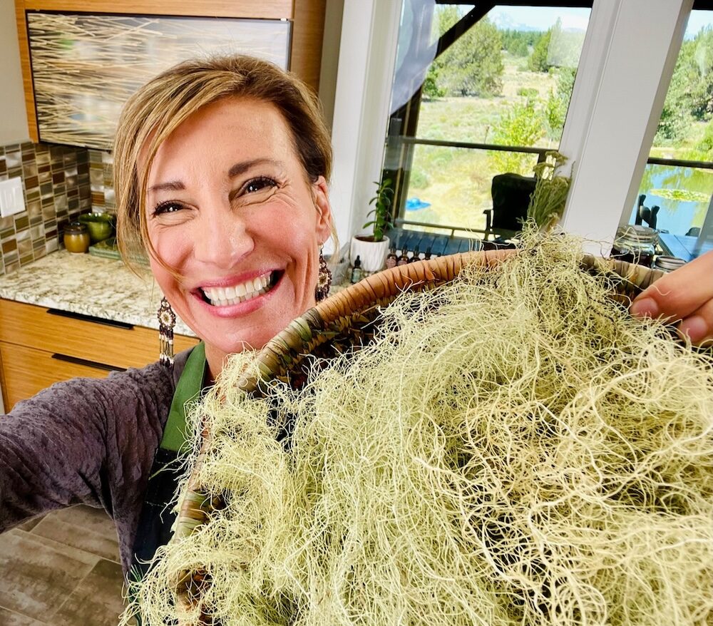Nicole Apelian with basket of foraged usnea lichen