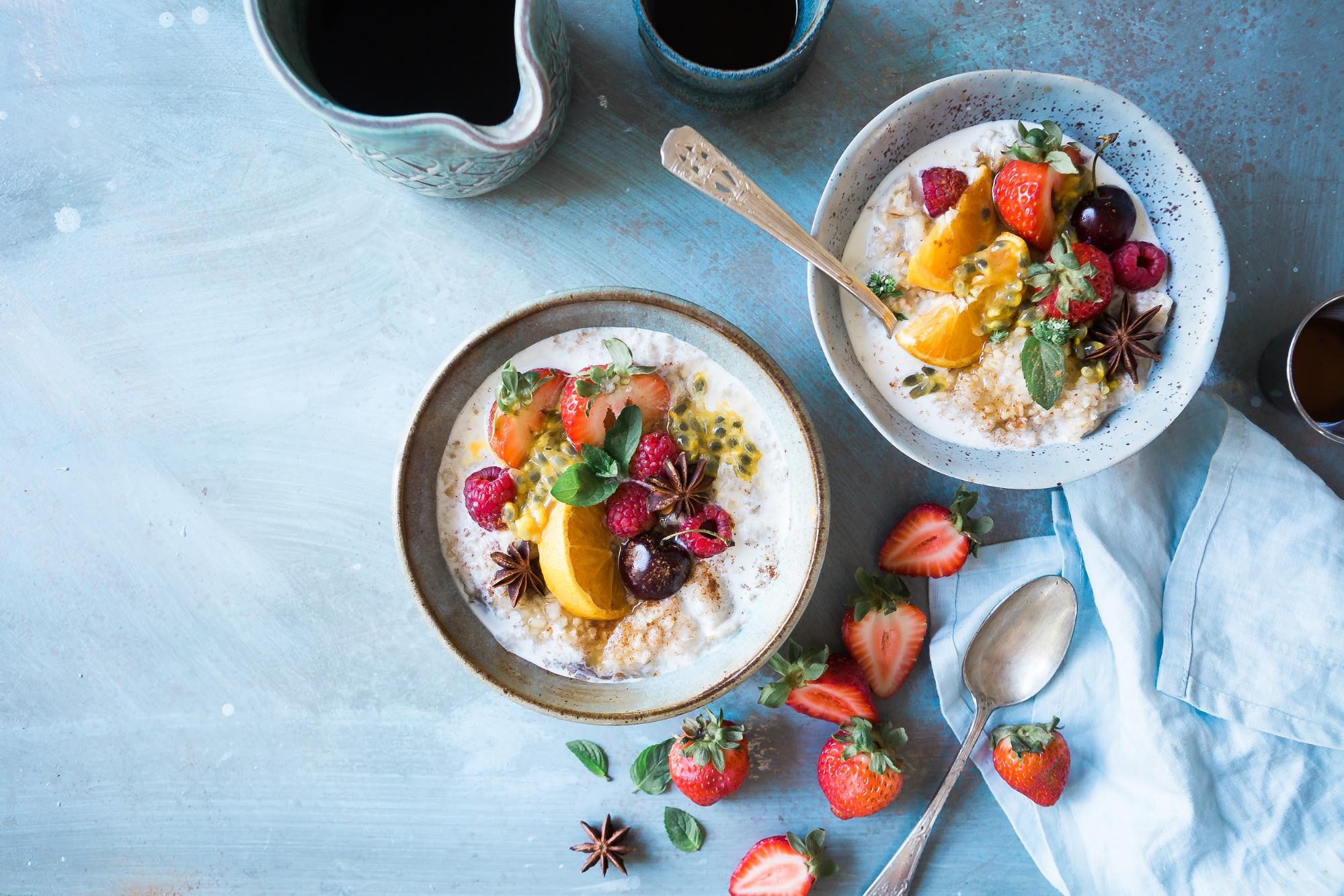 bowls of porridge with fresh fruit