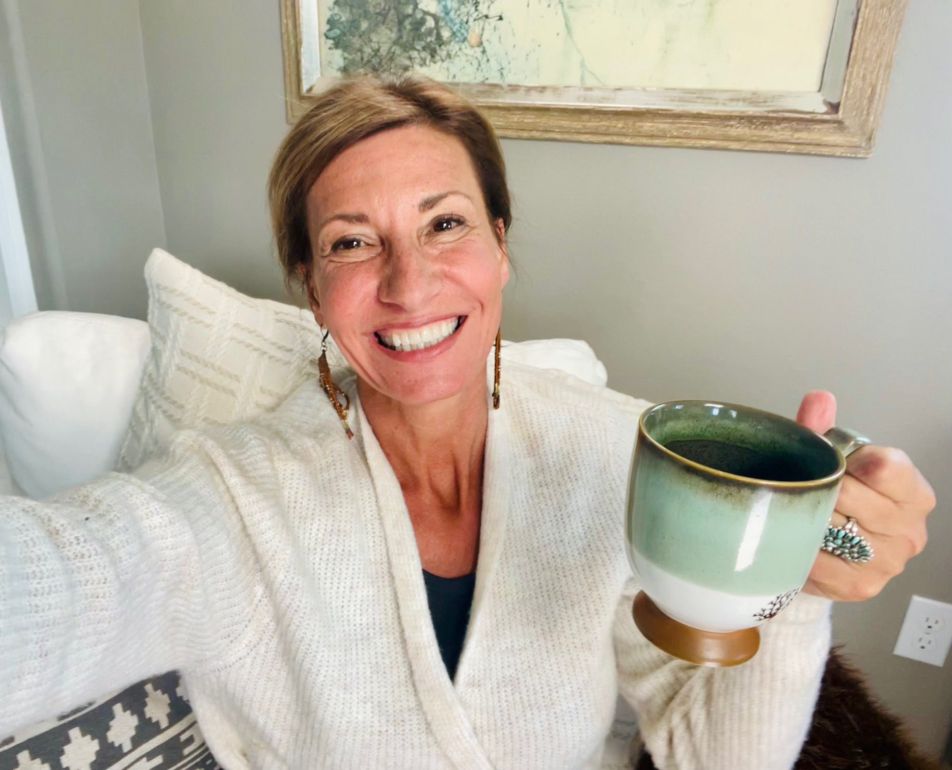 Nicole Apelian holding ceramic mug