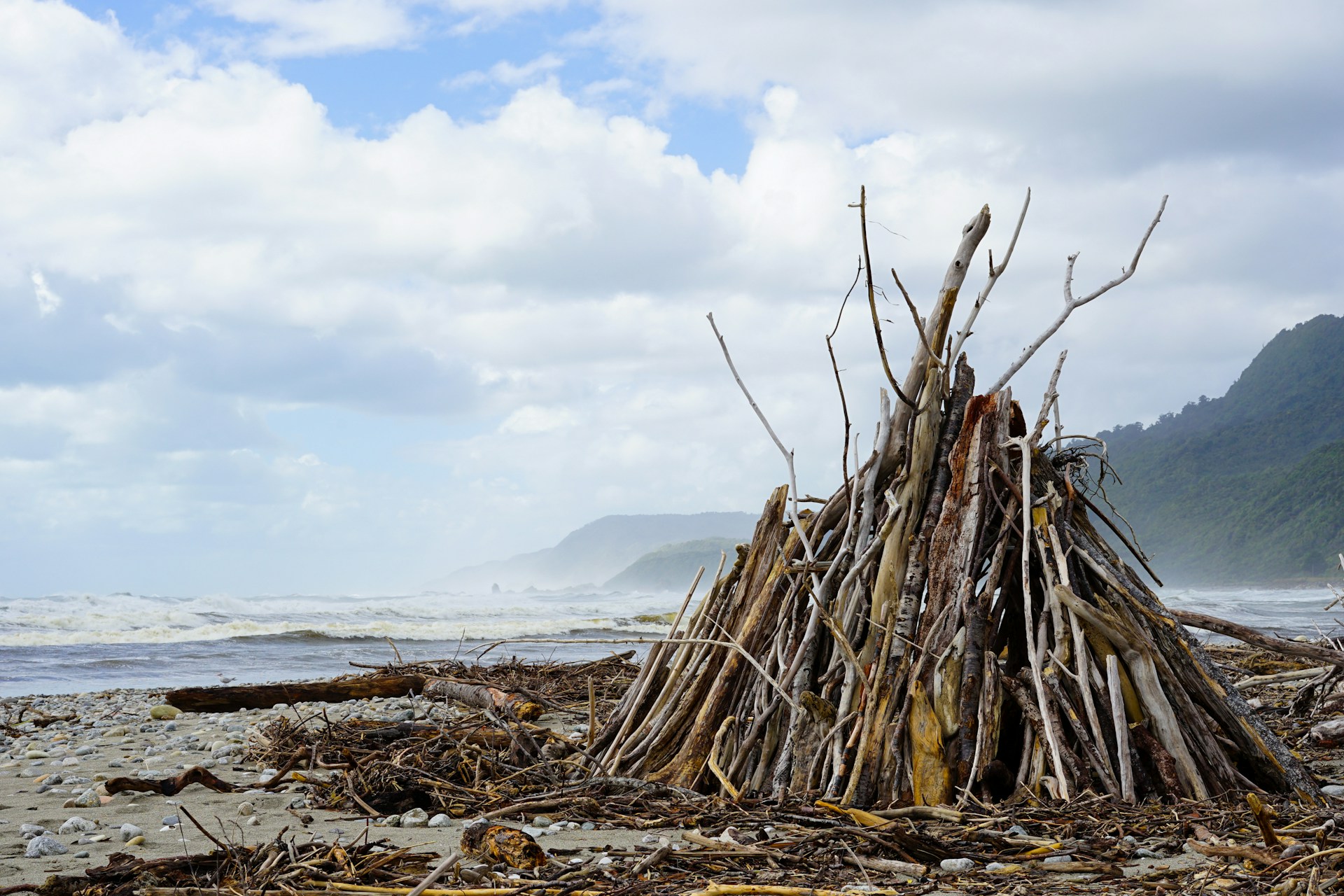 completed debris shelter on beach