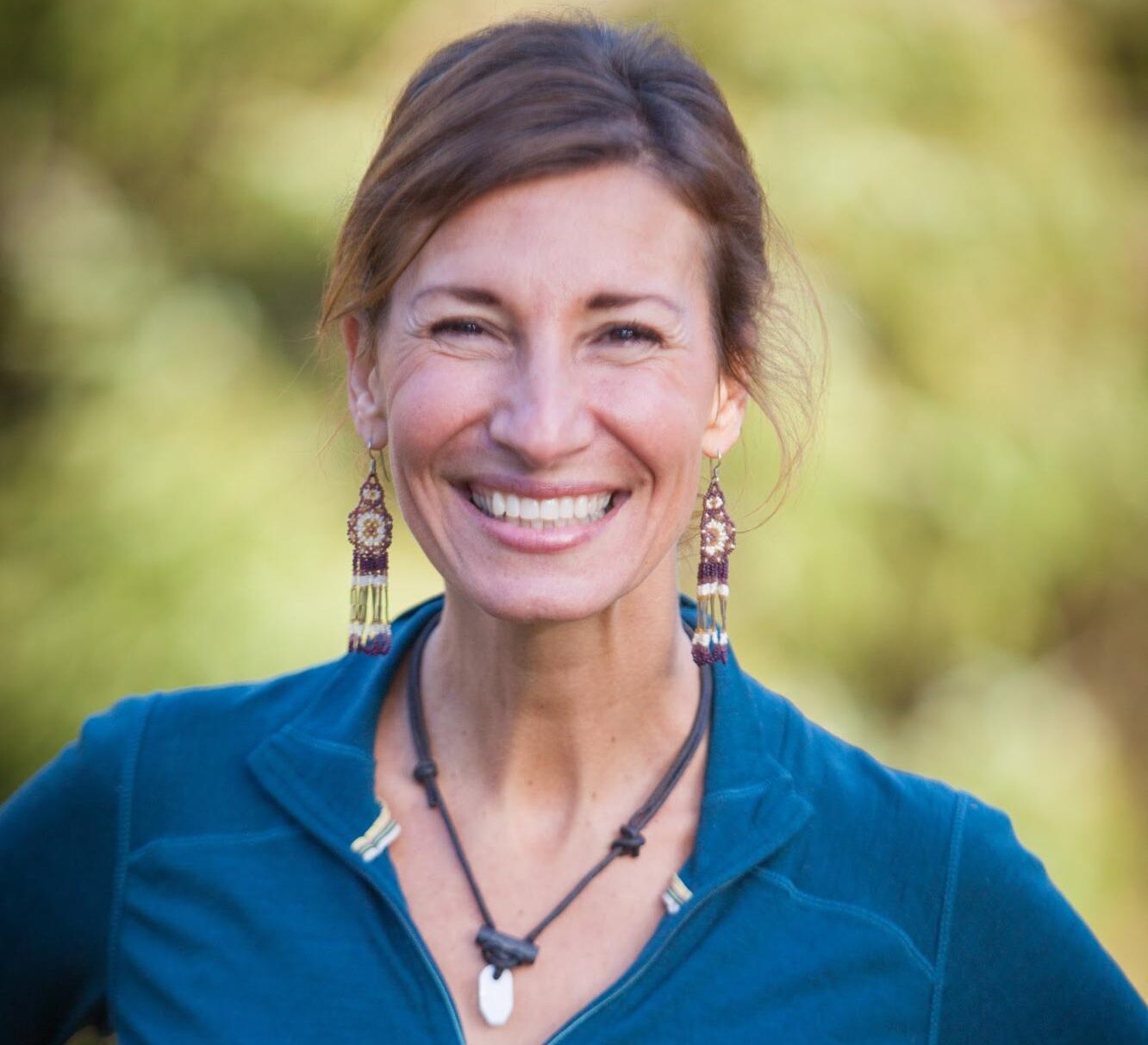 Nicole Apelian smiling in blue shirt Cannabis & ADHD: Here’s What You Need to Know