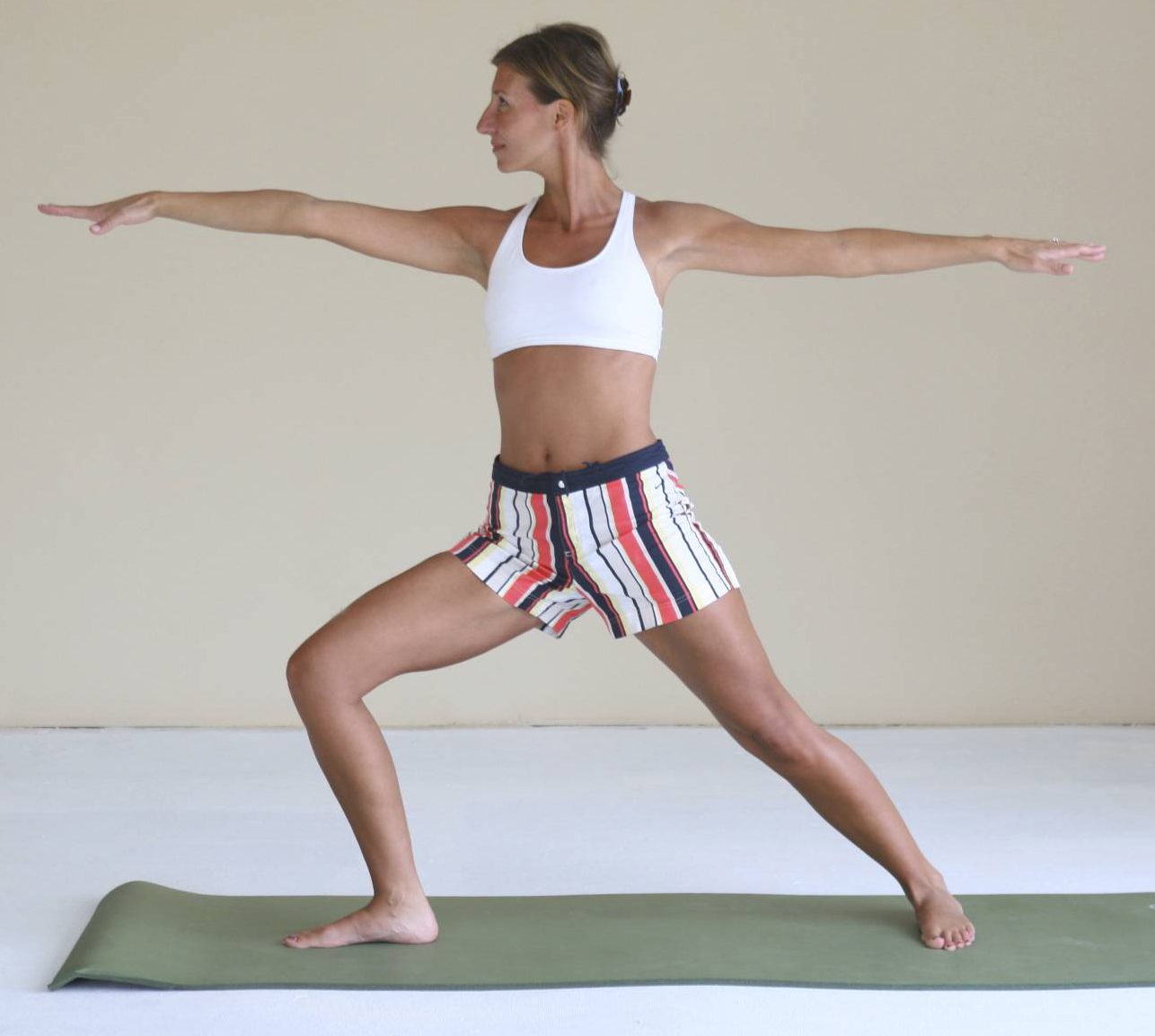 Nicole Apelian warrior pose Flow into Wellness: Yoga for Better Lymphatic Circulation and Immunity