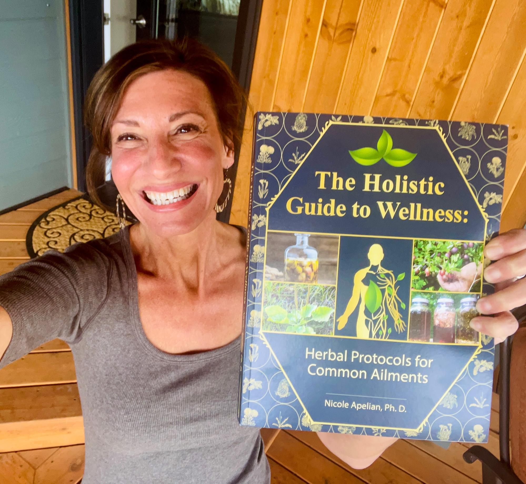Nicole Apelian and her Holistic Guide to Wellness book