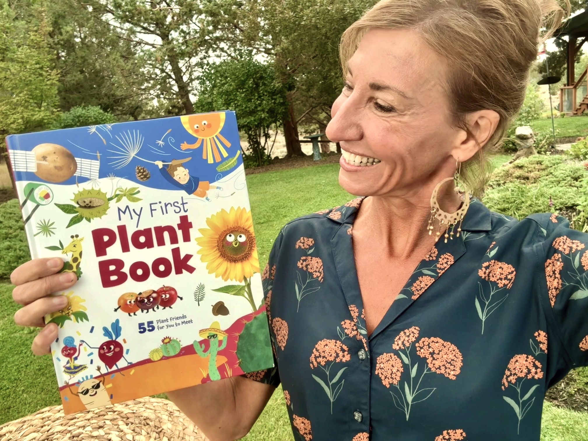 Nicole Apelian holding her children's book "My First Plant Book"
