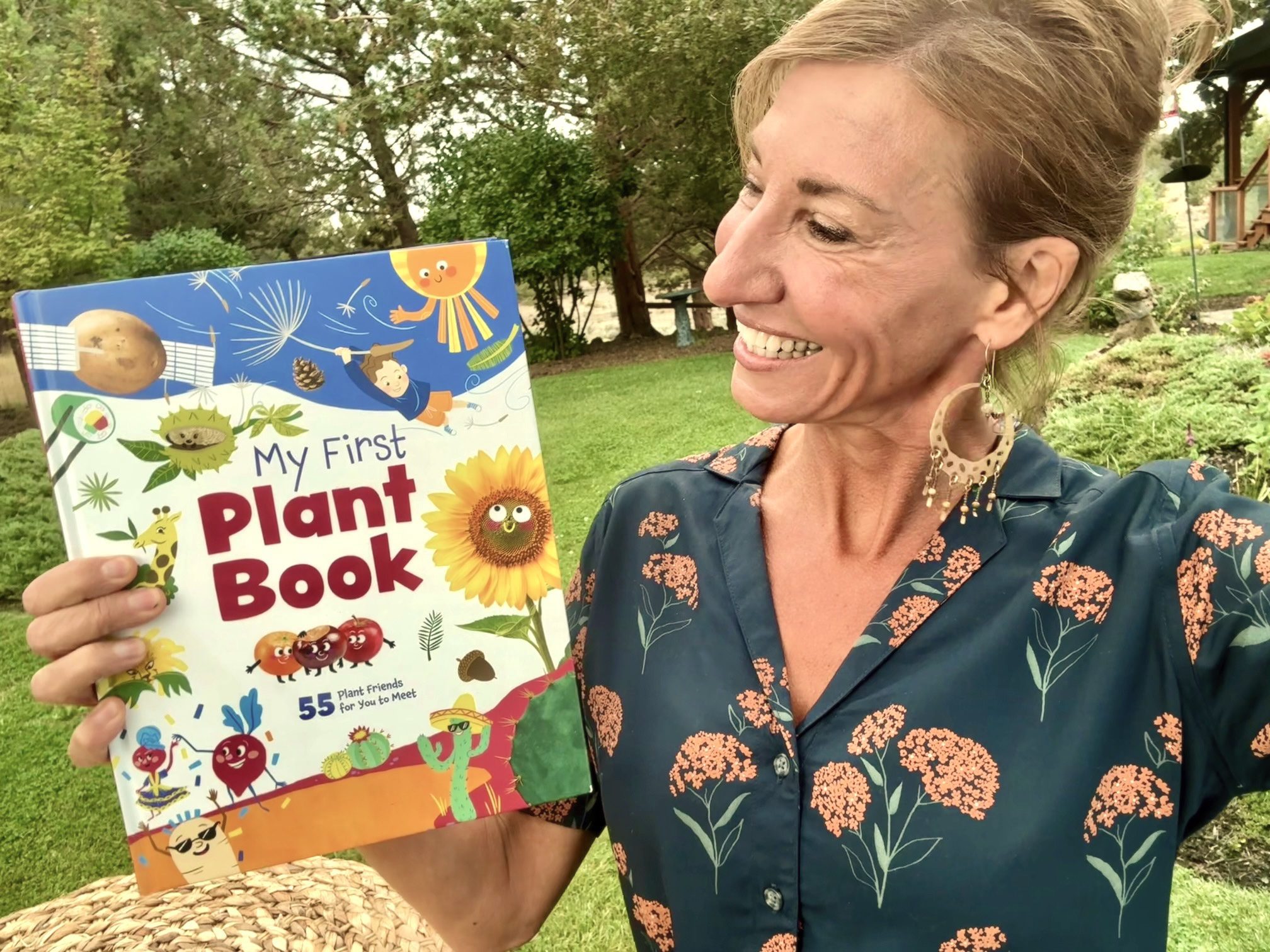 Nicole Apelian and My First Plant Book Nicole Apelian holding her children's book "My First Plant Book"