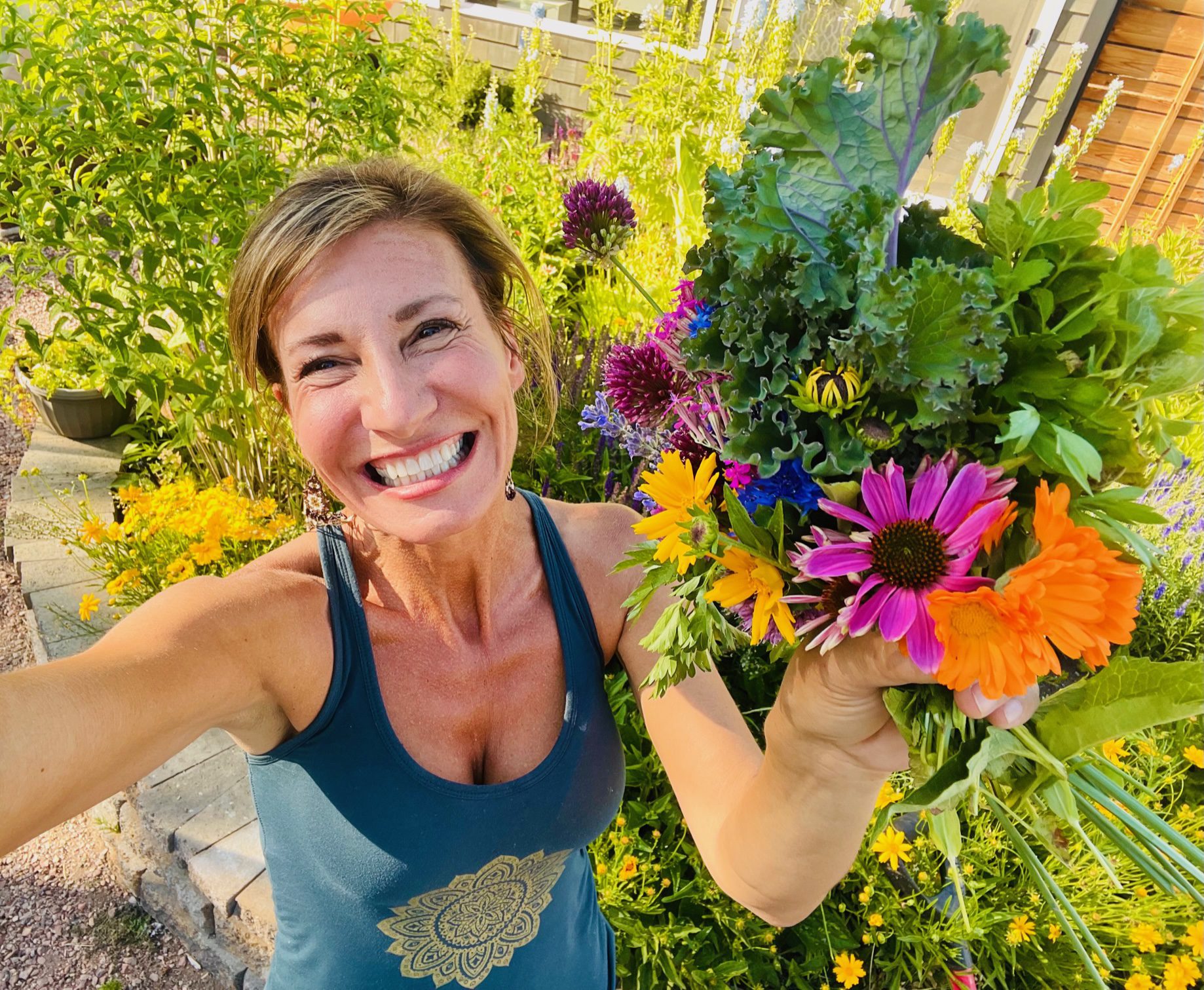 Nicole Apelian with garden bounty Nature’s Most Potent Anti-Aging Secret