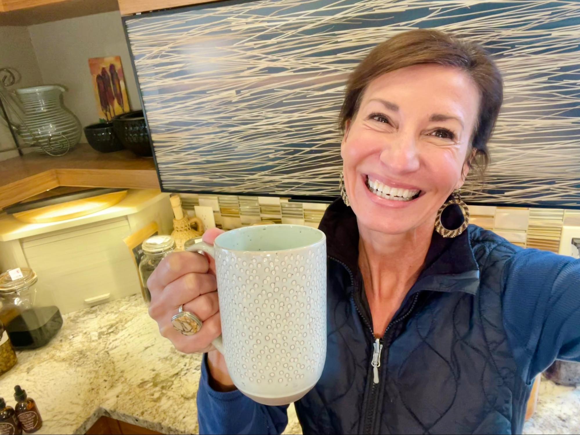 Nicole Apelian holding mug